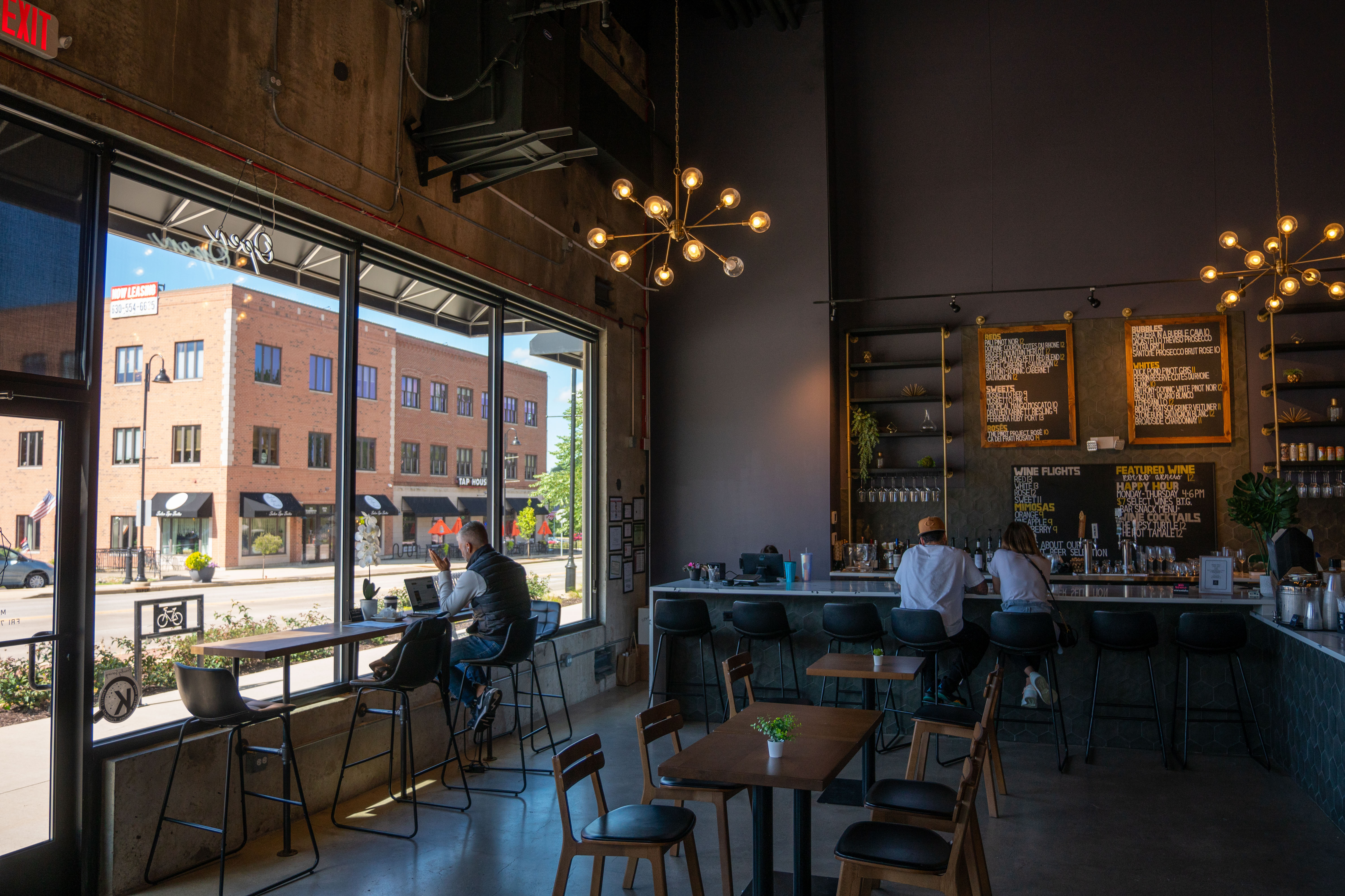 Inside a local Oswego restaurant and wine bar with downtown views