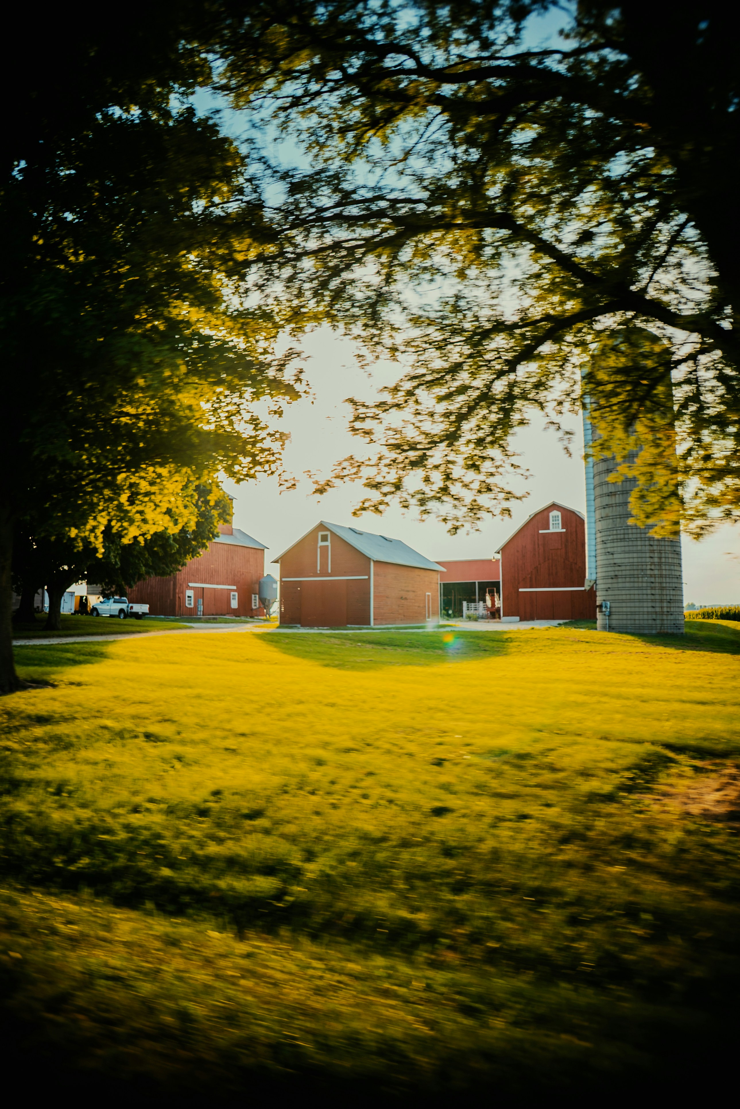 Rural barn and farmland in Kendall County at sunset